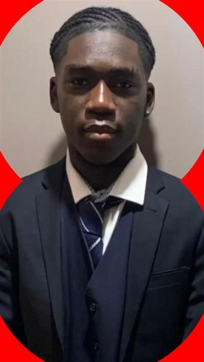 Marcus Fakana in his  navy school uniform, looking to the camera.