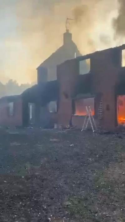 A burnt out house - only the shell remains