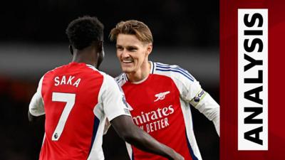 Bukayo Saka & Martin Odegaard embrace