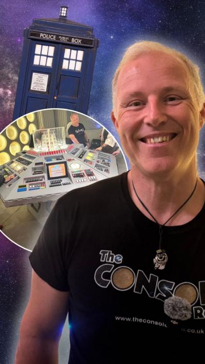 A man smiles to camera, a galaxy graphic with a blue telephone box and picture of the console room can be seen