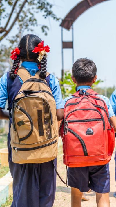 Schoolchildren with back packs
