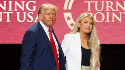 Donald Trump and Erika Kirk during a memorial service for Turning Point.