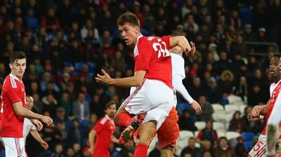 Emyr Huws heads a goal