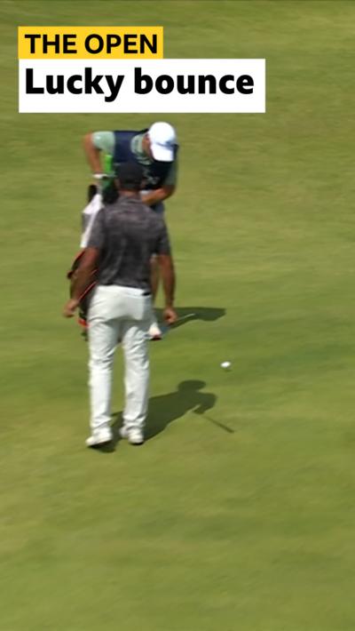 Aaron Rai and caddie