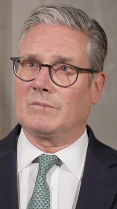 Sir Keir Starmer, in a blue tie.