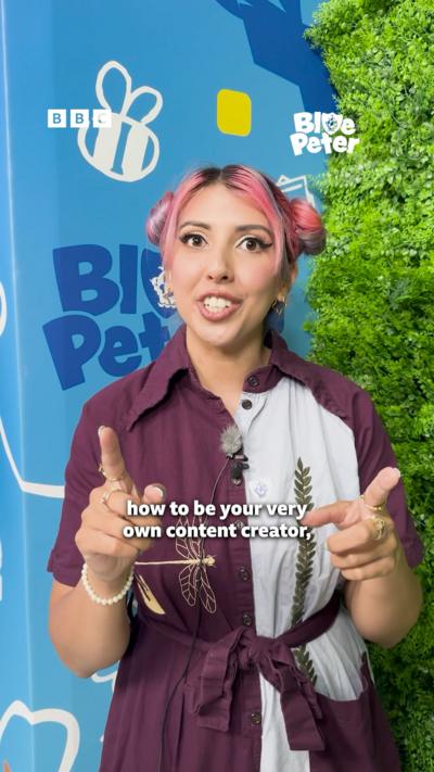 Yammy, a young woman with pink hair in bunches giving tips on getting into content creation.