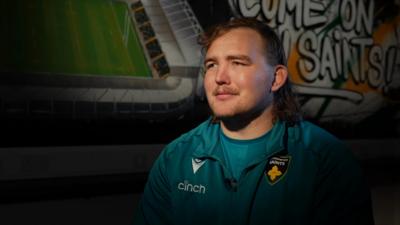 JJ Van Der Mescht wearing green Northampton Saints shirt