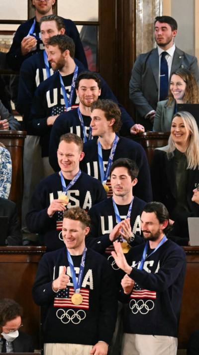 Members of the US Men's Olympic hockey team are recogized by US President Donald Trump.