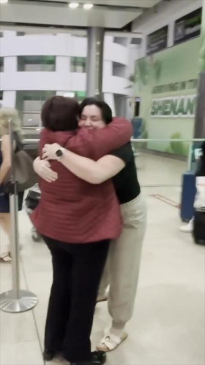 Two women hugging