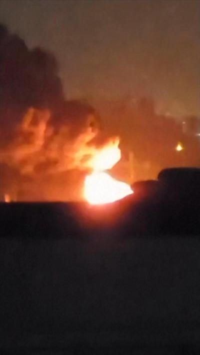 Plumes of smoke fill the skyline in Tehran after Mehrabad Airport was hit by airstrikes