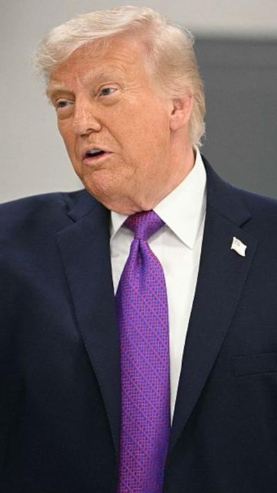 Trump speaks at an impromptu press conference.