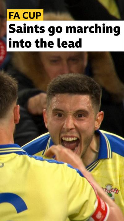 Ross Stewart celebrates scoring the first goal against Arsenal in the FA Cup