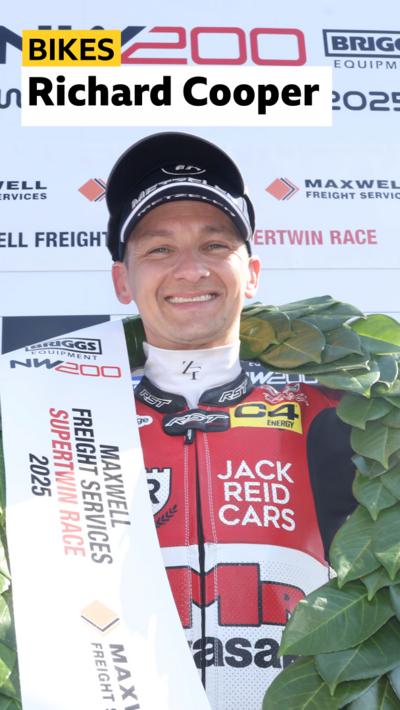 Richard Cooper celebrates winning the Supertwin race at the 2025 NW200