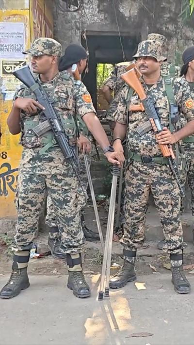 Security officials standing guard outside counting centre