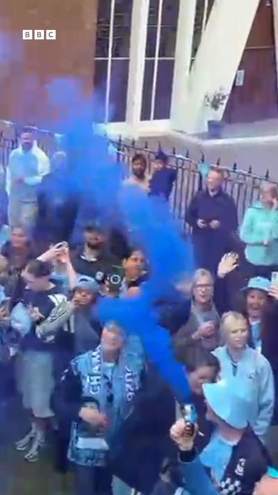 Blue smoke with Coventry City fans