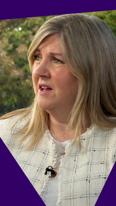 Alison Johnstone is in frame with a purple graphic border around her.