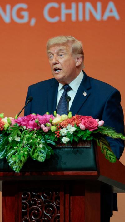 Trump speaking from podium during state banquet in China
