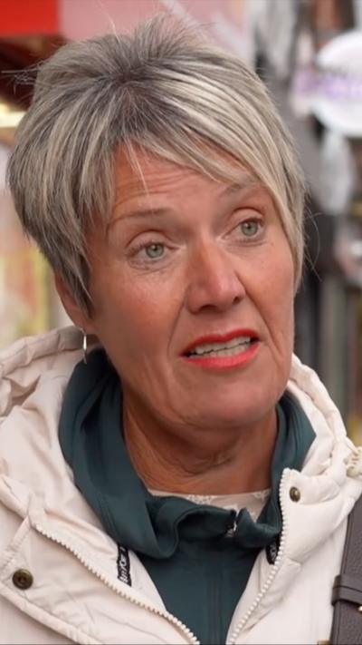A woman with short blond hair