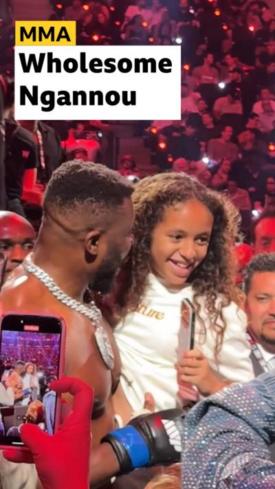 Francis Ngannou holding his daughter