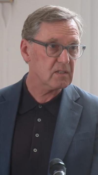 Alan Milburn during press conference