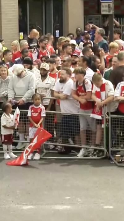 Aresnal fans behind a barrier