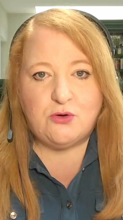A close up of Northern Ireland justice minister during a remote interview