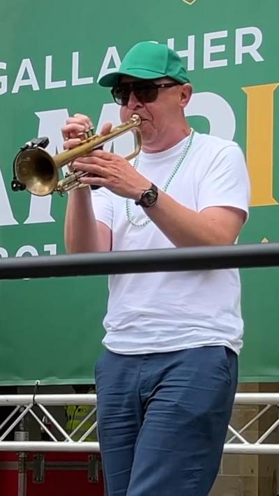 A man playing on stage