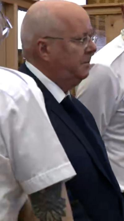 Murrell leaves the dock after he is jailed for over five years