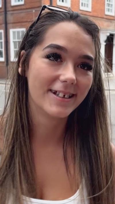 A young woman with long brown hair