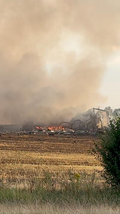 Smoke rises into the air from a building fire