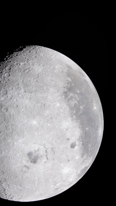 Detailed telescopic view of the Moon against a black sky