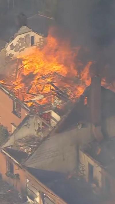 A house engulfed in flames