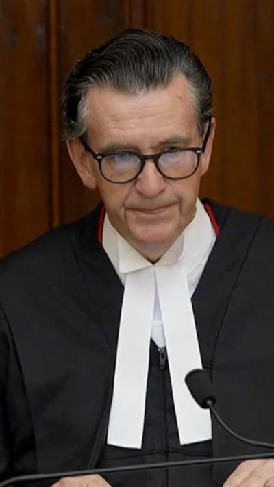 Judge speaking in court