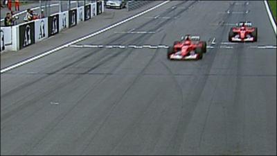 Michael Schumacher overtakes Rubens Barrichello