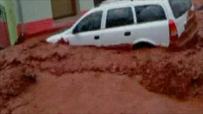 A car in the red sludge