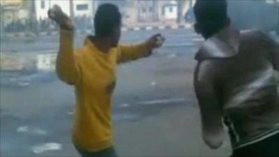 Protesters throw rocks at police