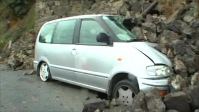 Vehicle crushed under rocks