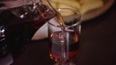 Mead being poured into a glass