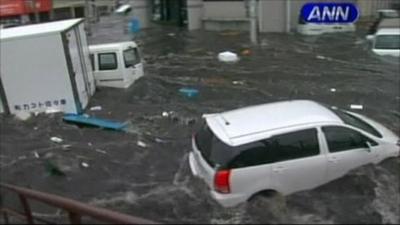 Cars being swept away