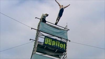 Shallow diver leaps 36ft into paddling pool