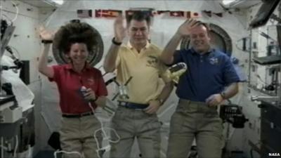 Cady Coleman, Paolo Nespoli and Ron Garan on the ISS