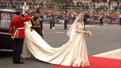 The bride in a dress designed by Sarah Burton