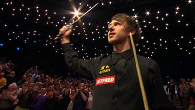 Judd Trump salutes the Crucible after beating Ding Junhui in the semi-final