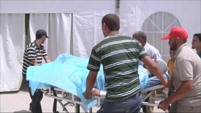 Injured man wheeled into hospital in Misrata