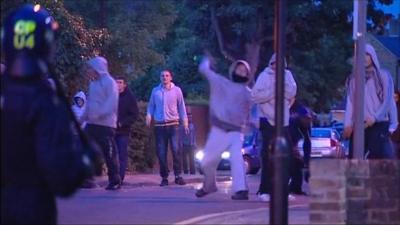 Police clash with riot police