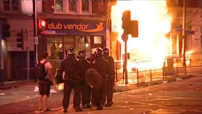 Police officers tackling unrest