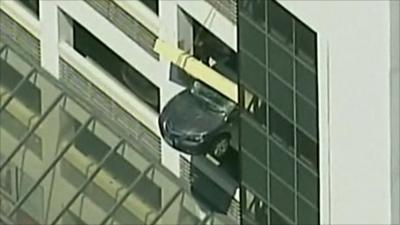 The car hanging from the car park