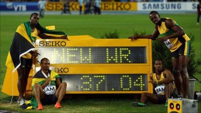 The Jamaican quartet with their new world record time for the 4x100m relay