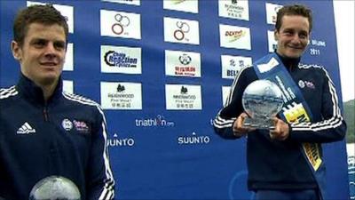 Jonny and Alistair Brownlee hold their trophies