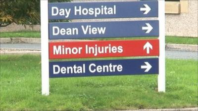 Sign showing directions to hospital departments